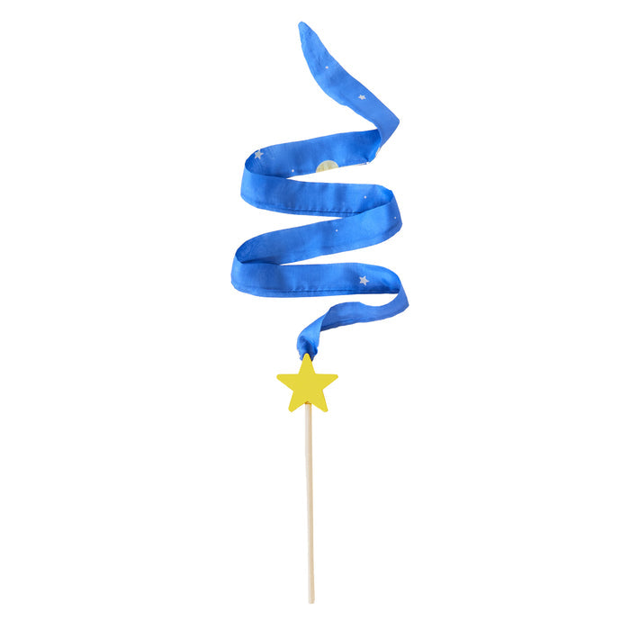 The Star Streamer by Sarahs Silks features a spiral blue ribbon with small white stars wrapping around a stick, ending in a yellow star. Its perfect for open-ended play against a white backdrop, showcasing its whimsical design while encouraging the development of gross motor skills.