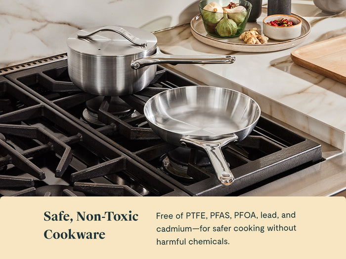 A Caraway Stainless Steel Fry Pan, 8", sits on a stovetop beside a cutting board with vegetables. Text reads: Safe, Non-Toxic Cookware—free from harmful chemicals.