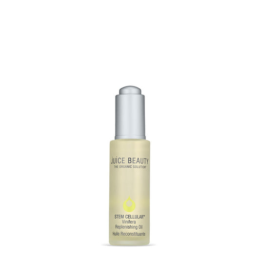 A bottle of Juice Beauty Stem Cellular Vinifera Replenishing Oil + Primer with a silver cap features the brand and product details in light green and black on a white label—an ideal addition to your daytime primer routine.