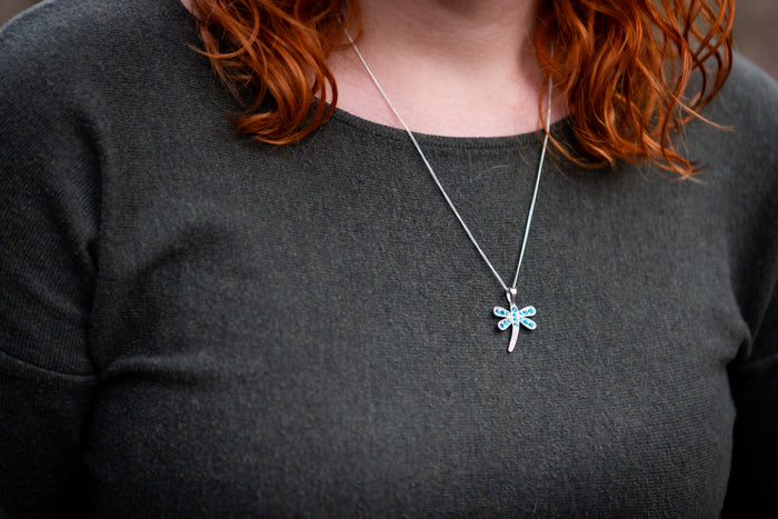 sterling silver dragonfly necklace being worn