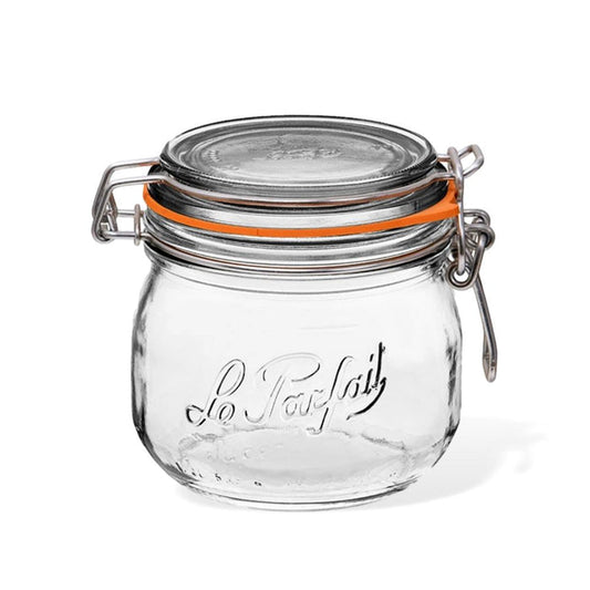 The Le Parfait Storage and Canning Glass Jar, 500ml, features a metal latch and airtight seal. Its made from recyclable glass and embossed with the brand name. It sits against a plain white background.