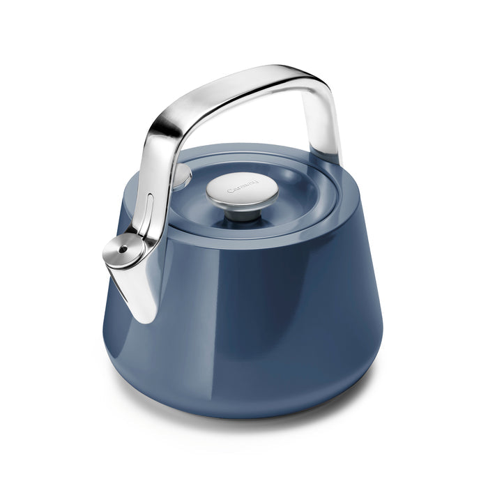 Caraways Stovetop Whistling Tea Kettle in sleek modern blue features a shiny metal lid, stainless steel handle, and minimalist design with a smooth rounded base. The ergonomic grip is sturdy and made from non-toxic materials to ensure effortless pouring.