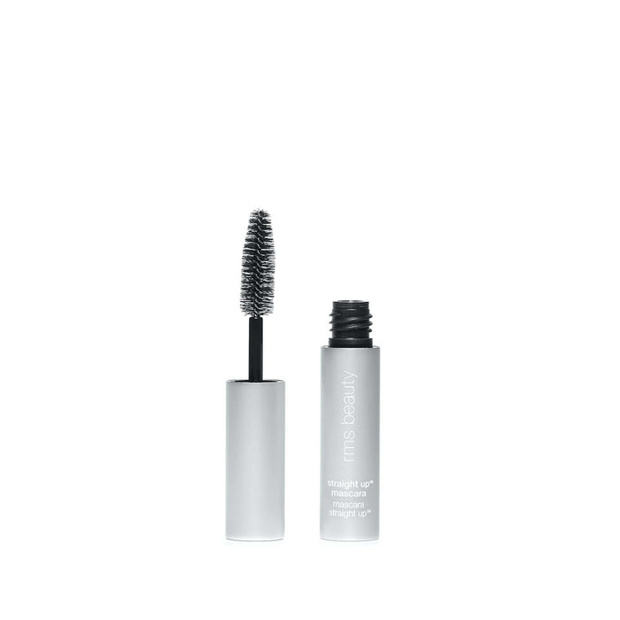 A silver tube labeled RMS Beauty Straight Up™ Volumizing Peptide Mascara stands open with its wand, coated in black formula—perfect for adding volumizing definition with every swipe.