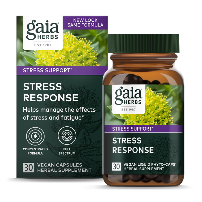 Gaia Herbs Stress Response vegan capsules come in a box and bottle adorned with yellow flowers and purple-green accents, highlighting the adaptogenic herbs; it promotes a concentrated full-spectrum formula for managing stress and fatigue. Contains 30 capsules.