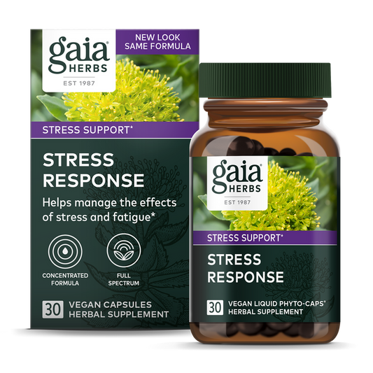 Gaia Herbs Stress Response vegan capsules come in a box and bottle adorned with yellow flowers and purple-green accents, highlighting the adaptogenic herbs; it promotes a concentrated full-spectrum formula for managing stress and fatigue. Contains 30 capsules.
