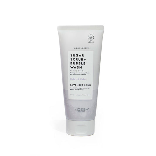 A white tube of VOESH New Yorks Sugar Scrub + Bubble Wash - For Scalp and Body in Lavender Land features lavender and eucalyptus scents, emphasizing Relax & Calm and Vegan on the label, with minimalist packaging.