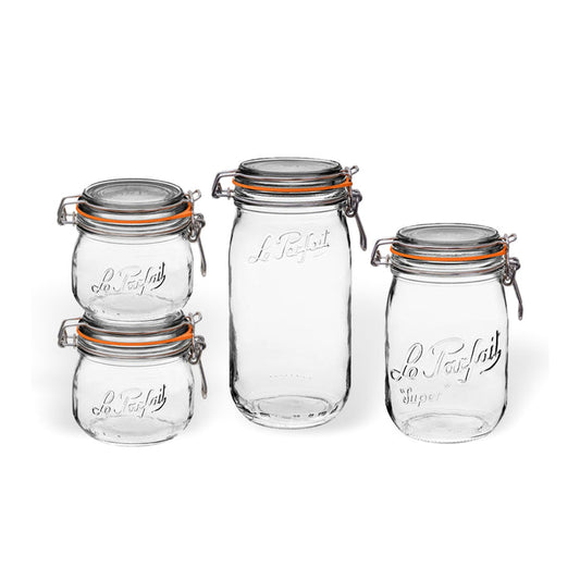The Super Jar Variety Pack by Le Parfait includes four clear jars with orange rubber seals and metal clasps for airtight storage. Embellished with Le Parfait Super Jars on the front, they are elegantly displayed against a white background.