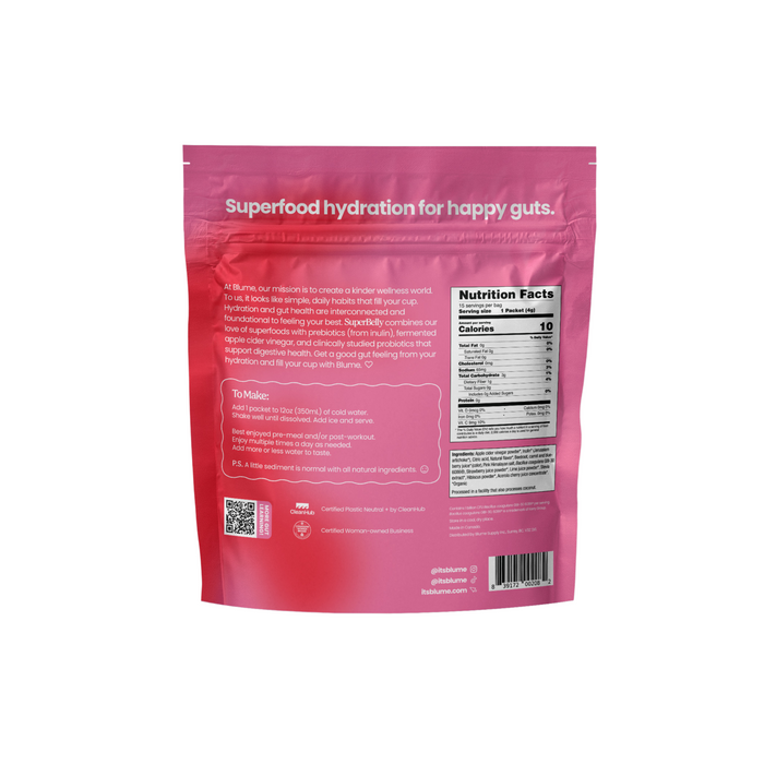 The back of a pink resealable package for blumes SuperBelly Probiotic Hydration Powder showcases Superfood hydration for happy guts in white, nutrition facts, and preparation instructions. Emphasizing probiotics for gut health, it includes a QR code and certification logos at the bottom.