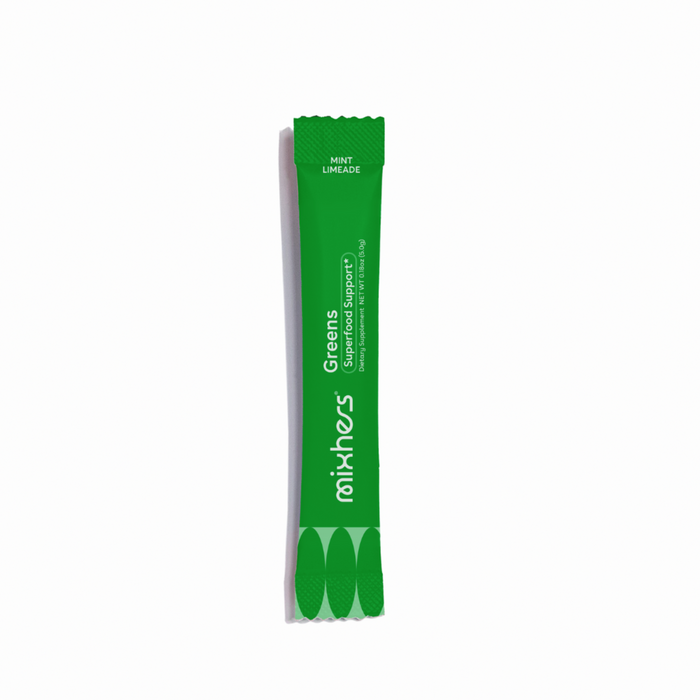A Mixhers single-serving green stick pack of mint limeade-flavored Superfood Greens Supplement Powder, designed for womens nutrition, features white text and is sealed at both ends for a natural detoxification boost.