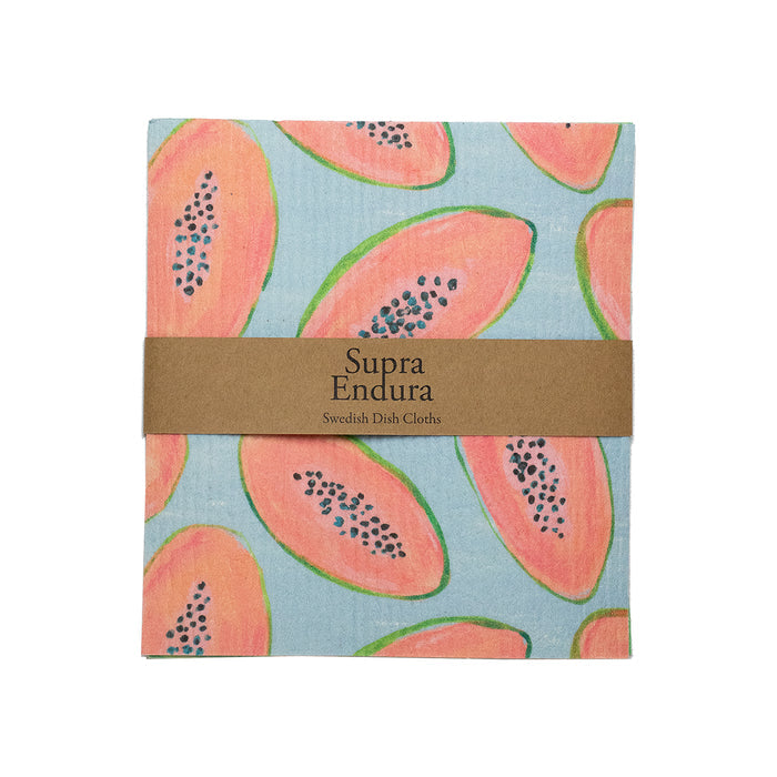 A whimsical papaya design adorns these super absorbent Supra Endura Swedish Dishcloths. Pink papaya slices with seeds embellish a light blue background, making eco cleaning stylish. They are wrapped in a brown paper band labeled with the brand name.