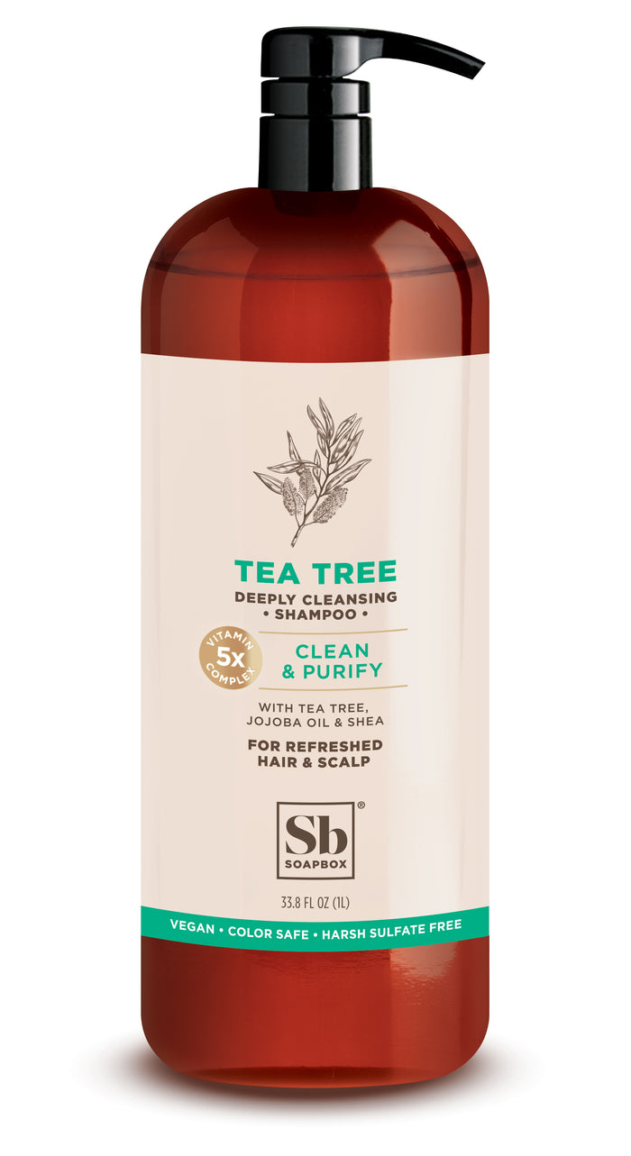 Soapboxs Shampoo Tea Tree 1 Liter Luxe has a pump dispenser and features tea tree, jojoba oil, and shea for clean hair and scalp. It offers purifying benefits, is vegan, color-safe, sulfate-free, and includes a 5% vitamin complex.