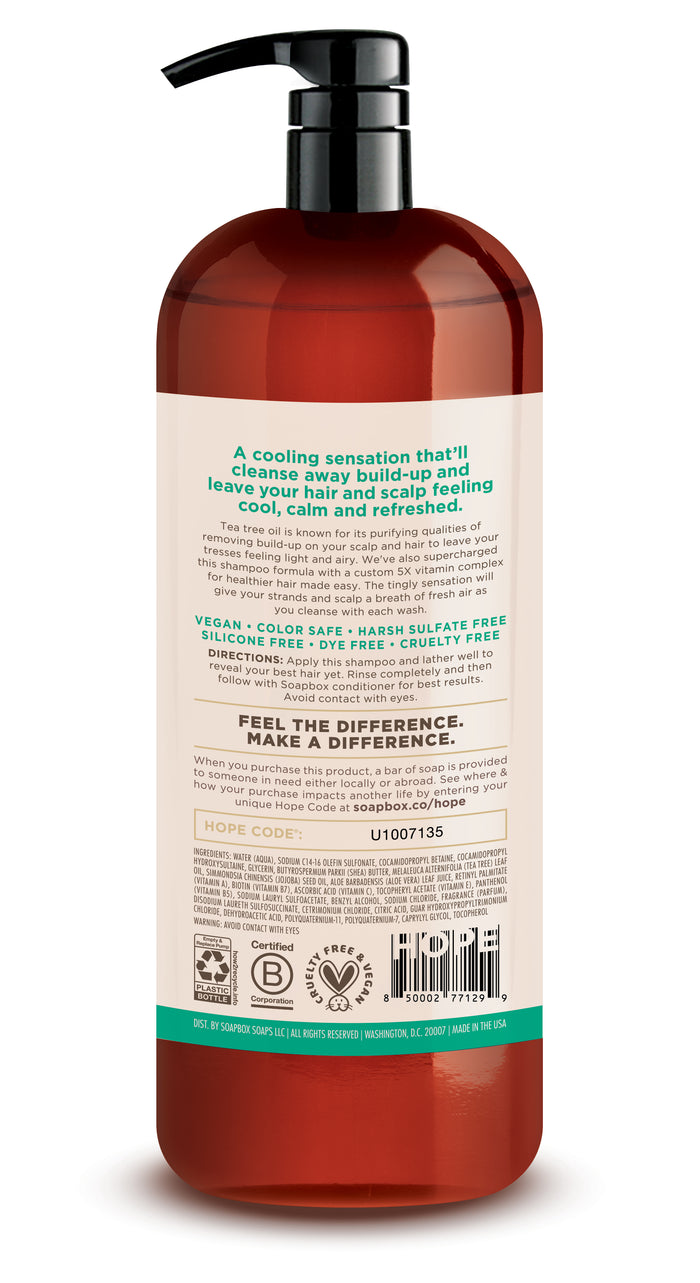 The Shampoo Tea Tree 1 Liter Luxe by Soapbox comes in a large pump dispenser bottle and is labeled as vegan, sulfate-free, paraben-free, and cruelty-free. It emphasizes cooling sensation and purifying qualities with visible product icons.