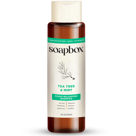 Soapbox Tea Tree & Mint Scalp Balancing Shampoo in a 16 fl oz bottle is sulfate-free, vegan, and color-safe. Enriched with vitamins, tea tree oil, rosemary, and green tea, it cleanses and restores while soothing the scalp for optimal balance.