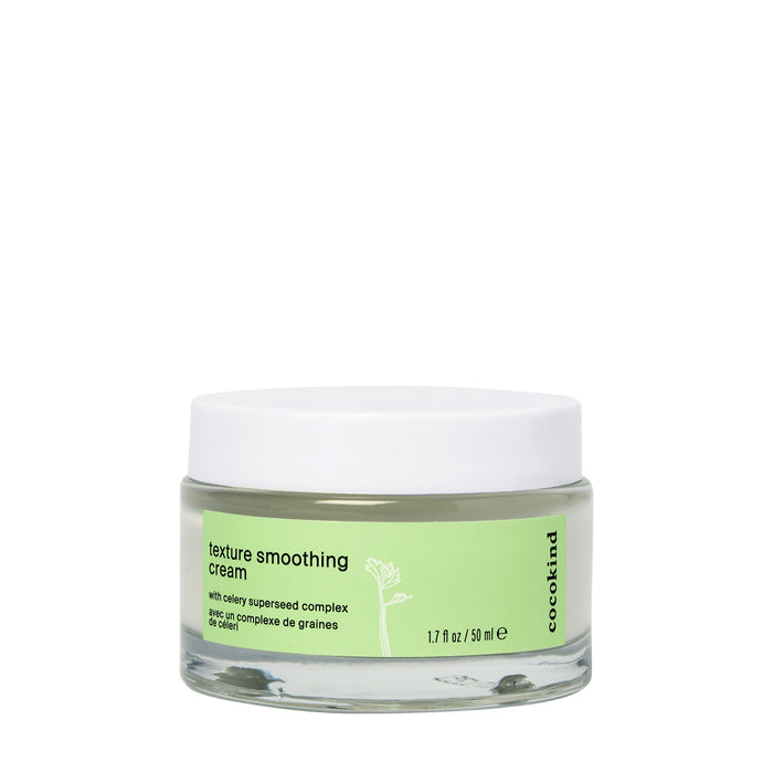 A 1.7 fl oz (50 ml) jar of Cocokind Texture Smoothing Cream enriched with Tsubaki seed oil, featuring a green label and white lid adorned with text and a plant stem illustration, perfect for daily moisturizing.