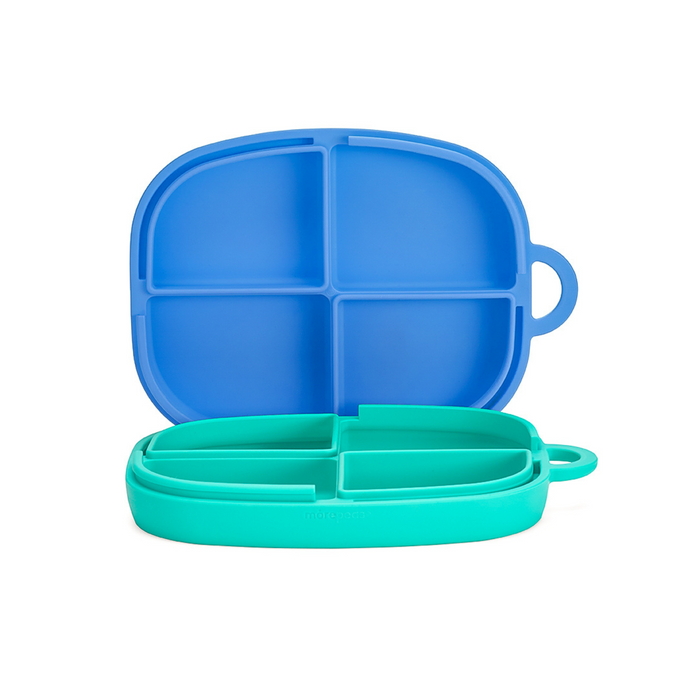 Discover the eco-friendly morepeas Everything Plate: stackable, bento box-inspired divided silicone plates in blue and green, each with four sections. Made from food-grade silicone with a convenient handle, these are perfect for kids and showcased on a simple white backdrop.