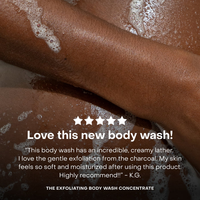 A close-up of an arm and shoulder covered in suds, with a review praising Everist’s The Exfoliating Body Wash Concentrate. White stars and bold text read “Love this new body wash!”—a must-have for anyone seeking smoother, exfoliated skin.