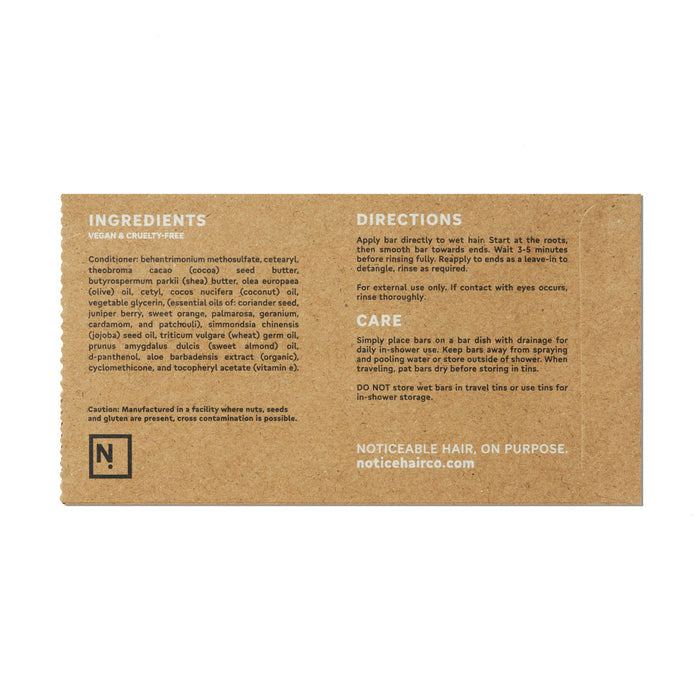 The Hydrator Conditioner Bar by NOT!CE Hair Co comes in brown cardboard packaging featuring the ingredients and directions sections. With coconut oil and shea butter, this moisturizing bar offers lush hydration; simply apply and rinse for plastic-free hair care.