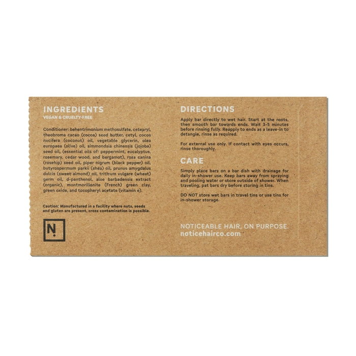 The Stimulator Conditioner Bar by NOT!CE Hair Co is displayed in cardboard packaging with ingredients and directions. Made in a plastic-free facility, its vegan and cruelty-free, includes hair growth tips, and advises against leaving it on for over 15 minutes.