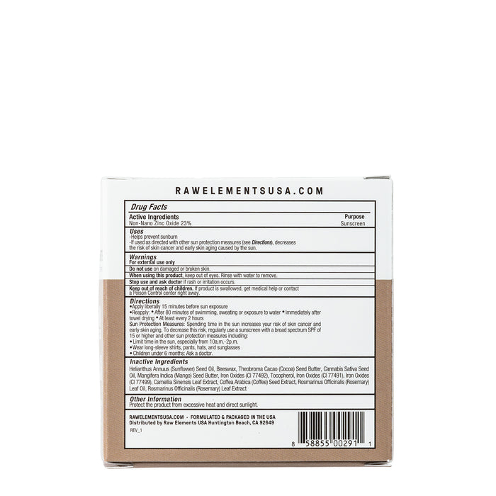 The image shows the back of Raw Elements Tinted Tin Bronze sunscreen package with details like drug facts, active ingredients (23% zinc oxide), directions, warnings, and company contact info. The recyclable tin is mostly white with black text and made with natural ingredients.