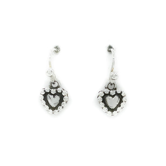 Sterling silver handcrafted heart shaped earrings - very delicate!&nbsp;
Measures approximately .25 by .25 inches, dangles .75 inches from earlobe
Sterling silver wires