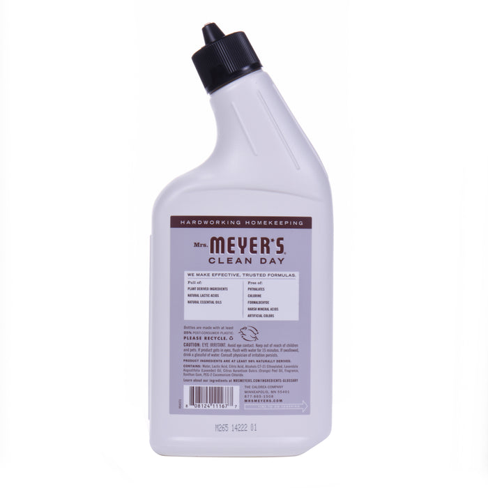 The Mrs. Meyers Toilet Cleaner features a black nozzle and a white, curved design for easy grip. Its label, against a plain white background, details ingredients like essential oils and usage instructions.
