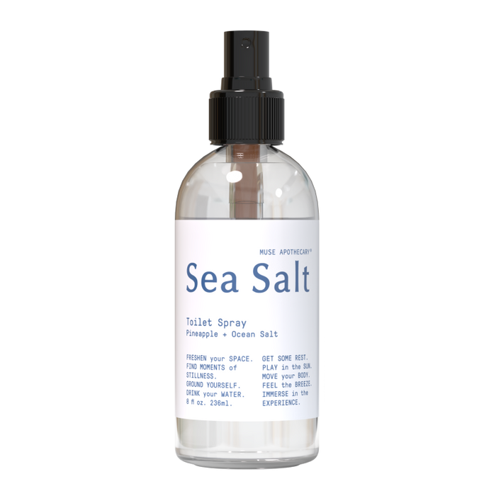 Muse Apothecarys Toilet Spray, in an 8 oz clear bottle with a black nozzle, offers a Pineapple + Ocean Salt scent. Its plant-based formula enhances your bathroom with a refreshing aroma for revitalizing moments.