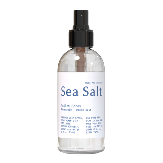 Muse Apothecarys Toilet Spray, in an 8 oz clear bottle with a black nozzle, offers a Pineapple + Ocean Salt scent. Its plant-based formula enhances your bathroom with a refreshing aroma for revitalizing moments.