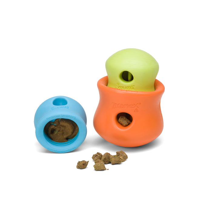 Discover the West Paw Treat Dispenser Dog Toy, designed to promote healthy and slow eating. This vibrant puzzle toy comes in colorful shapes, with an orange outer toy cradling green and blue toys filled with treats that stimulate your dogs engagement and playtime fun.