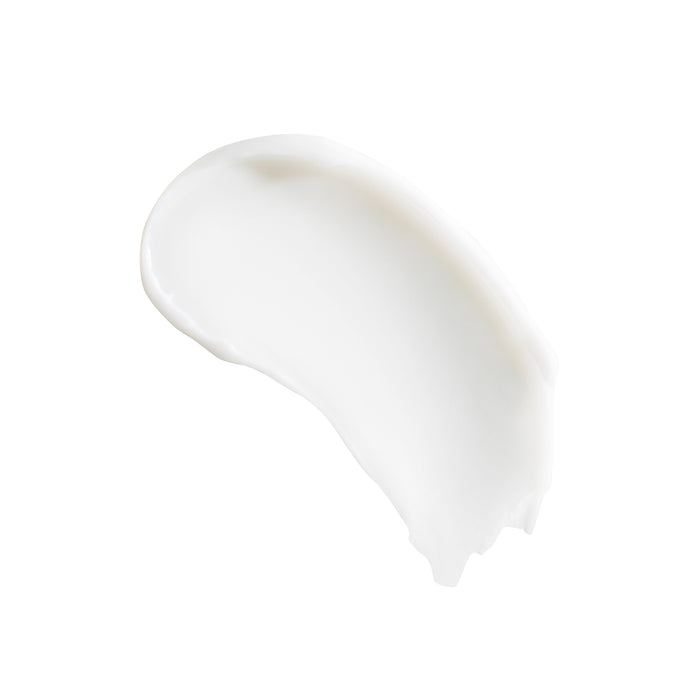 A smooth smear of creamy white lotion on a plain white background suggests the soft, silky texture of Mad Hippies Triple C Night Cream, enriched with vitamin C, ideal for natural skin care.