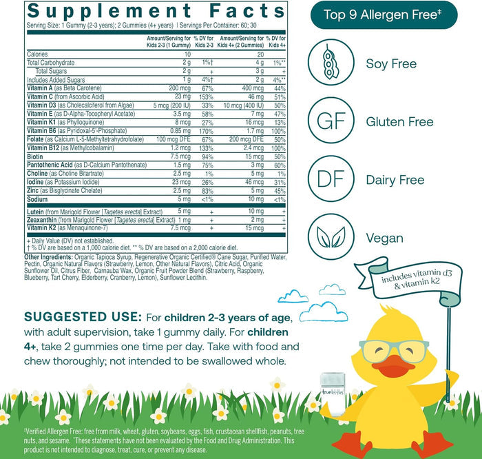The supplement facts label for True Grace True Littles Daily Kids Multivitamin Gummies lists vitamin and mineral amounts. Icons show it's free of the top 9 allergens, soy, gluten, dairy, and is vegan. A cartoon duck highlights vegan vitamins D3 and K2.