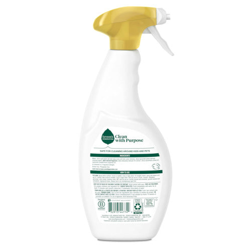 A white Seventh Generation Tub & Tile Cleaner spray bottle with a yellow nozzle, labeled Clean with Purpose, stands upright on a white background. The back label shows usage instructions and recycling symbols.
