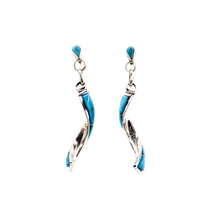 Handcrafted sterling silver and turquoise inlay earrings by Gloria Waatsa, Zuni jeweler&nbsp;
Each earring measures approximately 1.75 inches long by 1/8 of an inch wide

Sterling silver posts and backs