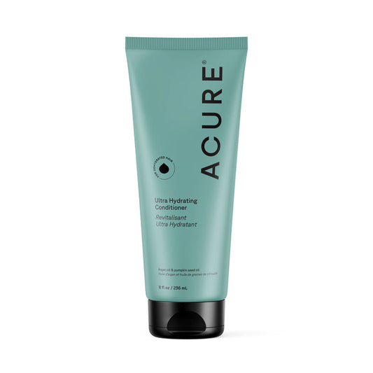 A teal tube of Acure Ultra Hydrating Conditioner with a black cap stands upright. Ideal for curly hair, the front label features the Acure brand name and product details in black and white text.