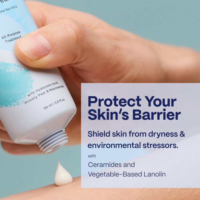 Close-up of a person squeezing moisturizer from a tube onto their hand. The tube has a blue label. Text beside it reads: "Protect Your Skin’s Barrier: Shield skin from dryness &amp; environmental stressors with Ceramides and Vegetable-Based Lanolin.