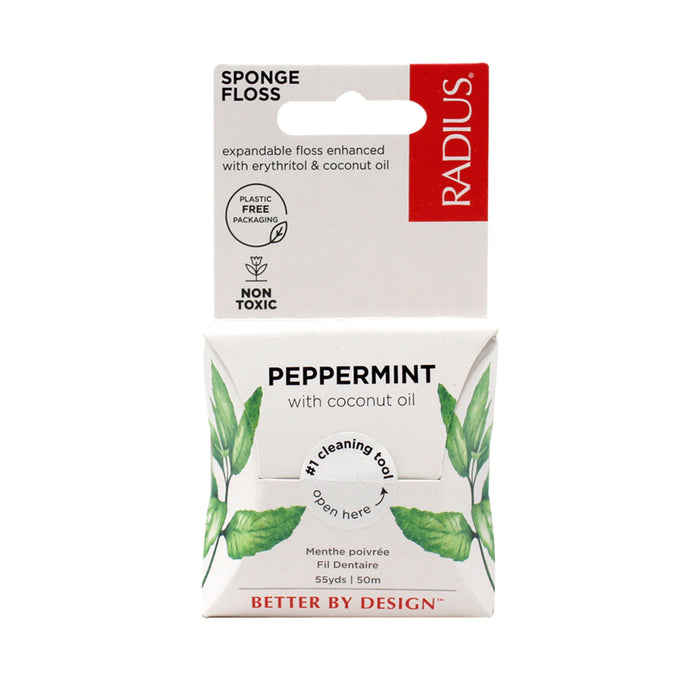 A 55-yard (50m) box of Radius Vegan Floss in peppermint and coconut oil, with cavity-fighting erythritol, green mint leaves, non-toxic, plastic-free packaging, and an easy-open tab.