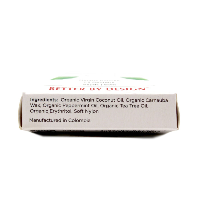 Close-up of Radius Vegan Floss box shows ingredients: organic virgin coconut oil, erythritol, carnauba wax, and more. Plastic-free packaging. Made in Colombia.