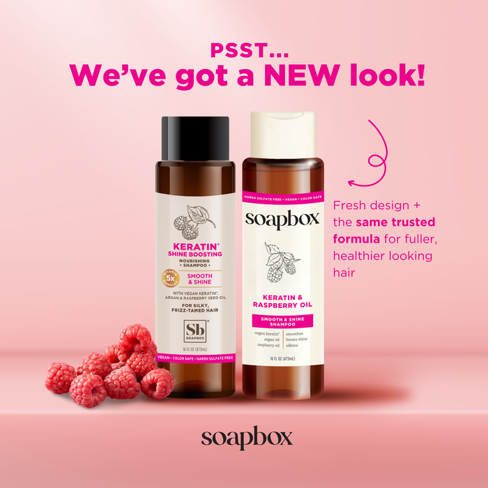Discover the redesigned Soapbox Vegan Keratin & Raspberry Seed Oil Smoothing Shampoo and Keratin & Raspberry Oil Conditioner, both now with a 5X vitamin complex. Fresh raspberries highlight the vibrant, color-safe, vegan-friendly formula for nourished hair.