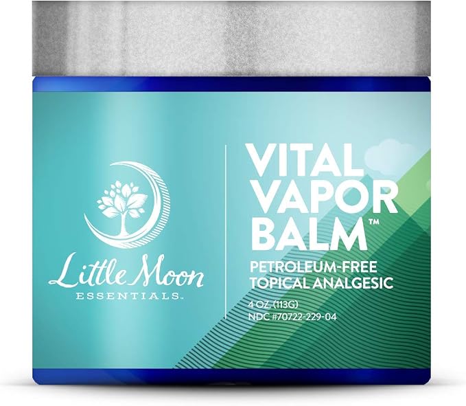 A container of Little Moon Essentials Vital Vapor Balm, a natural vapor balm and petroleum-free analgesic, is labeled as an essential oil chest rub and features a teal and blue design with white text on the front.