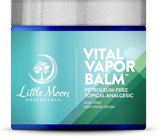 A container of Little Moon Essentials Vital Vapor Balm, a natural vapor balm and petroleum-free analgesic, is labeled as an essential oil chest rub and features a teal and blue design with white text on the front.