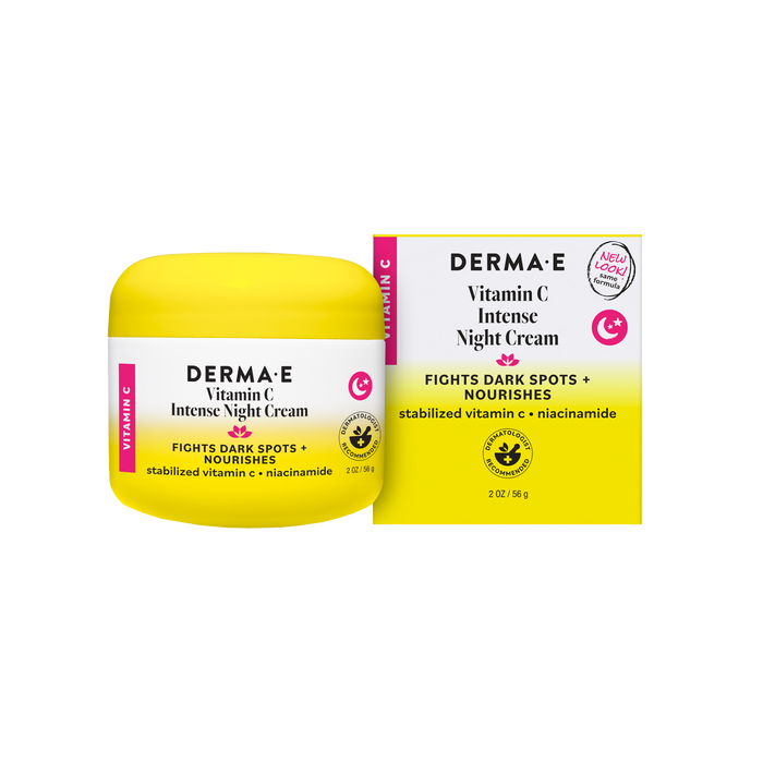 A yellow jar and box of Derma E Vitamin C Intense Night Cream with niacinamide, highlighted with text about targeting dark spots and nourishing skin. This Derma E night cream serves as both a vitamin C moisturizer and an anti-aging treatment, with matching labels on the box and jar.