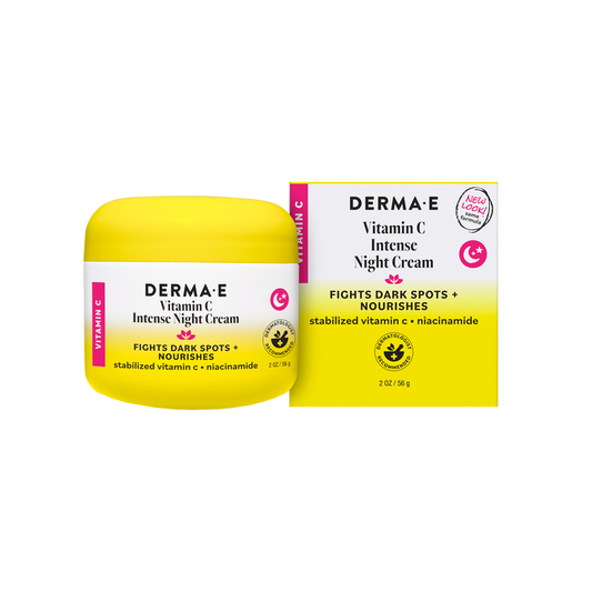 A yellow jar and box of Derma E Vitamin C Intense Night Cream with niacinamide, highlighted with text about targeting dark spots and nourishing skin. This Derma E night cream serves as both a vitamin C moisturizer and an anti-aging treatment, with matching labels on the box and jar.
