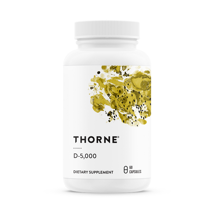 A white bottle labeled Thorne Vitamin D-5000 contains 60 capsules of a Vitamin D3 supplement to support immune function, featuring an abstract design with gold and green splashes.