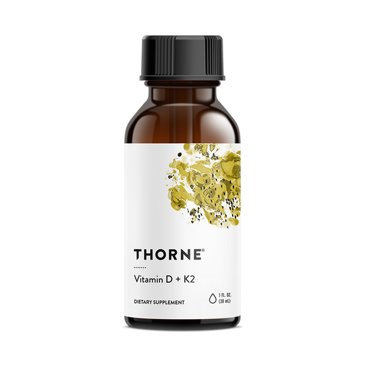 A brown glass bottle labeled with the brand name Thorne and product name Vitamin D + K2 features a white label with abstract yellow and black artwork. This 1 fl oz (30 ml) dietary supplement is formulated for immune support, combining vitamins D and K to enhance wellness.