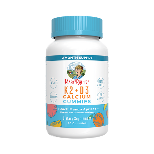 MaryRuths Vitamin K2+D3 Calcium Gummies come in a 60-count bottle with a blue cap and feature a vintage illustration of a woman. These peach-mango-apricot flavored gummies are vegan, gluten-free, suitable for ages 2+, and offer a nourishing 2-month supply.