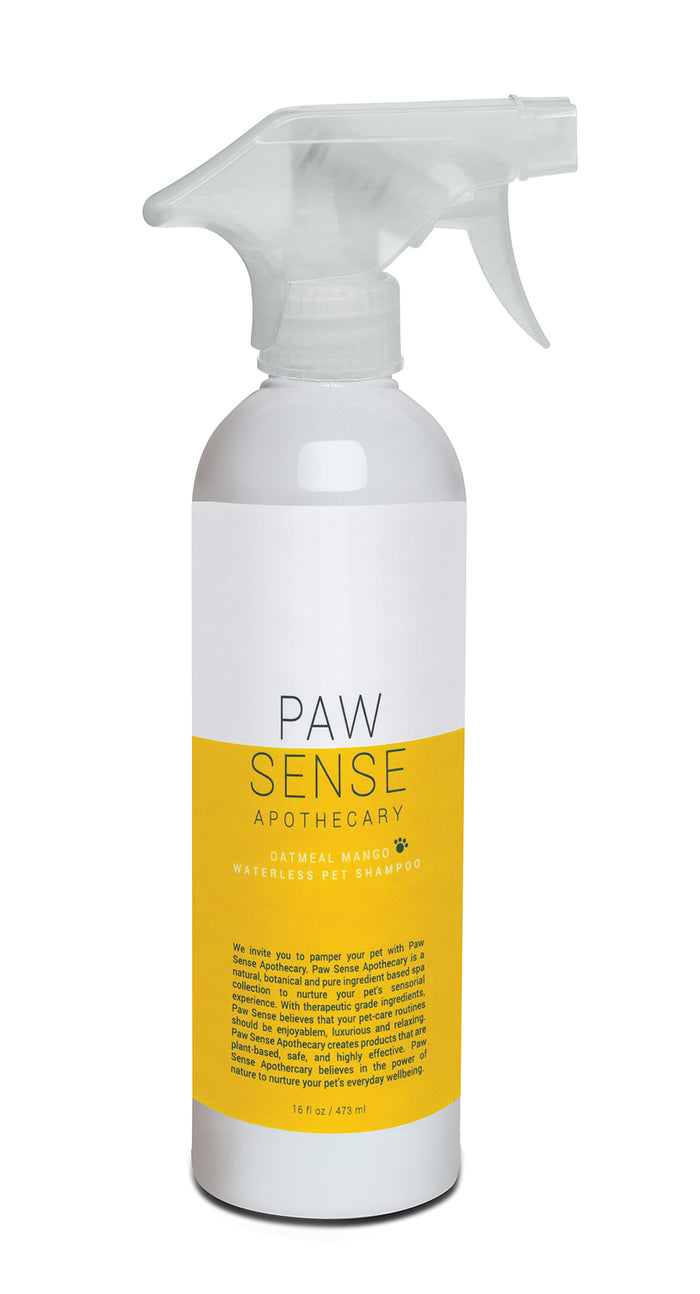 Paw Sense Waterless Pet Shampoo comes in a white spray bottle with a clear nozzle, featuring a yellow label and text. Naturally fragranced with oatmeal and mango, its perfect for grooming dogs and cats.