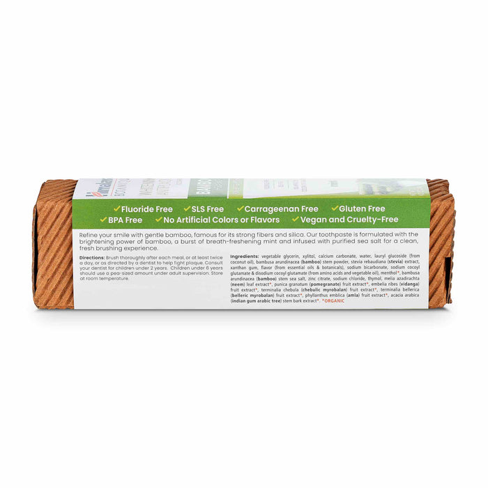 The Himalaya Whitening Antiplaque Bamboo + Sea Salt Toothpaste box features green labels marking it as Fluoride, BPA, SLS, Carrageenan, and Gluten-Free. It contains bamboo and silica for cleaning and is vegan, cruelty-free with no artificial colors or flavors.