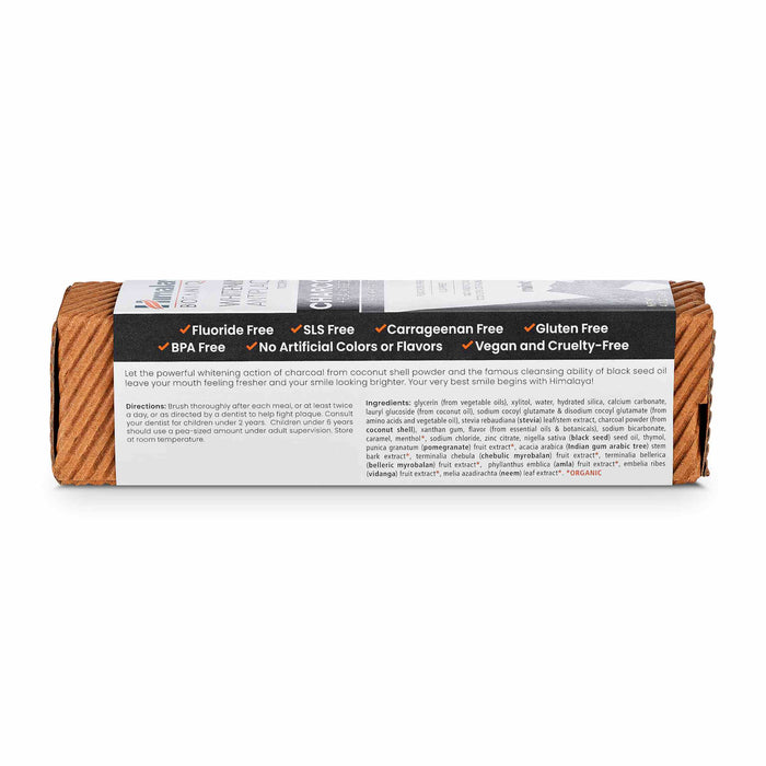 The Himalaya Whitening Antiplaque Charcoal + Black Seed Oil Toothpaste comes in a cylindrical, wood-textured package. It is fluoride-free, SLS-free, gluten-free, vegan, and cruelty-free with no artificial colors or flavors for a pure brushing experience.