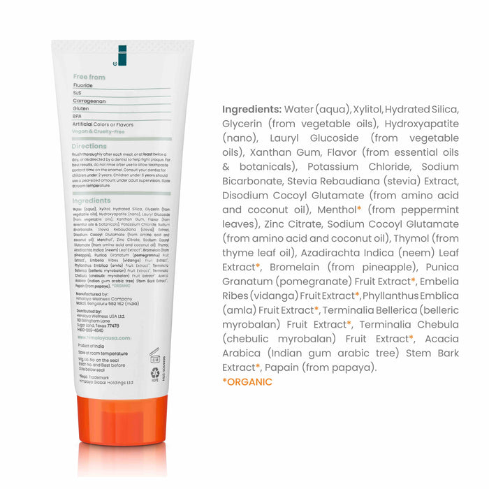 A tube of Himalaya Whitening+ Hydroxyapatite Toothpaste is shown. The label includes ingredients, directions, and benefits. This fluoride-free toothpaste features organic extracts like mint, fruit, and essential oils, emphasizing its whitening properties with hydroxyapatite.
