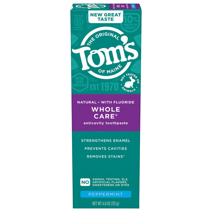 A teal and purple box of Tom's of Maine Whole Care Fluoride Toothpaste in peppermint flavor highlights enamel strengthening, teeth whitening, and cavity prevention.