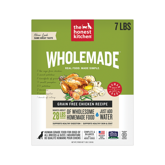 A 7 lb box of The Honest Kitchen Wholemade™ Grain Free Chicken Dog Food, with vibrant ingredient art and details. The label shows it makes 28 lbs of human grade food for dogs—just add water.